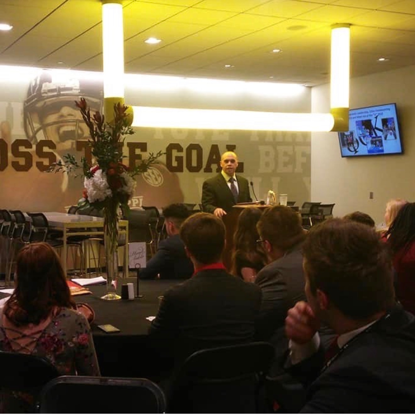 Tyson Lee speaking at a corporate event